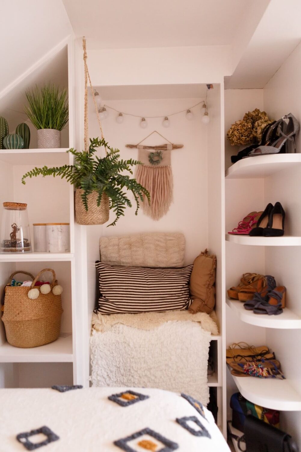 A Colorful Maximalist Home in London 44 open-wardrobe-seating-storage-bedroom
