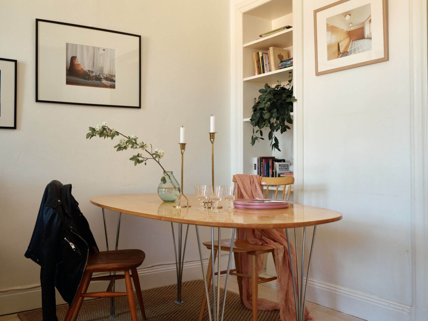 A Charming Apartment with Muted Blue Bedroom 7 oval-dining-table-built-in-cabinet-nordic-home-nordroom