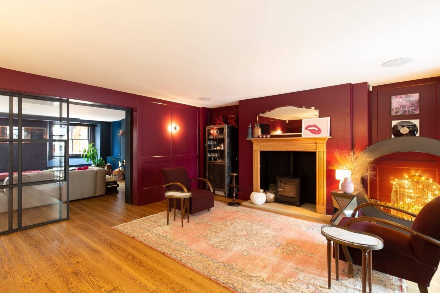 A Colorful Georgian Home in London 5 pink-bar-room-fireplace-wooden-floor-blue-play-room-nordroom