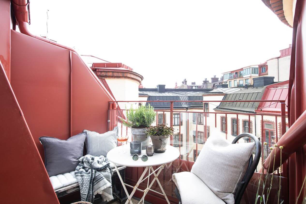 A Light Nordic Attic Loft with Raw Walls and Skylights 16 rooftop-balcony-scandinavian-attic-apartment-nordroom