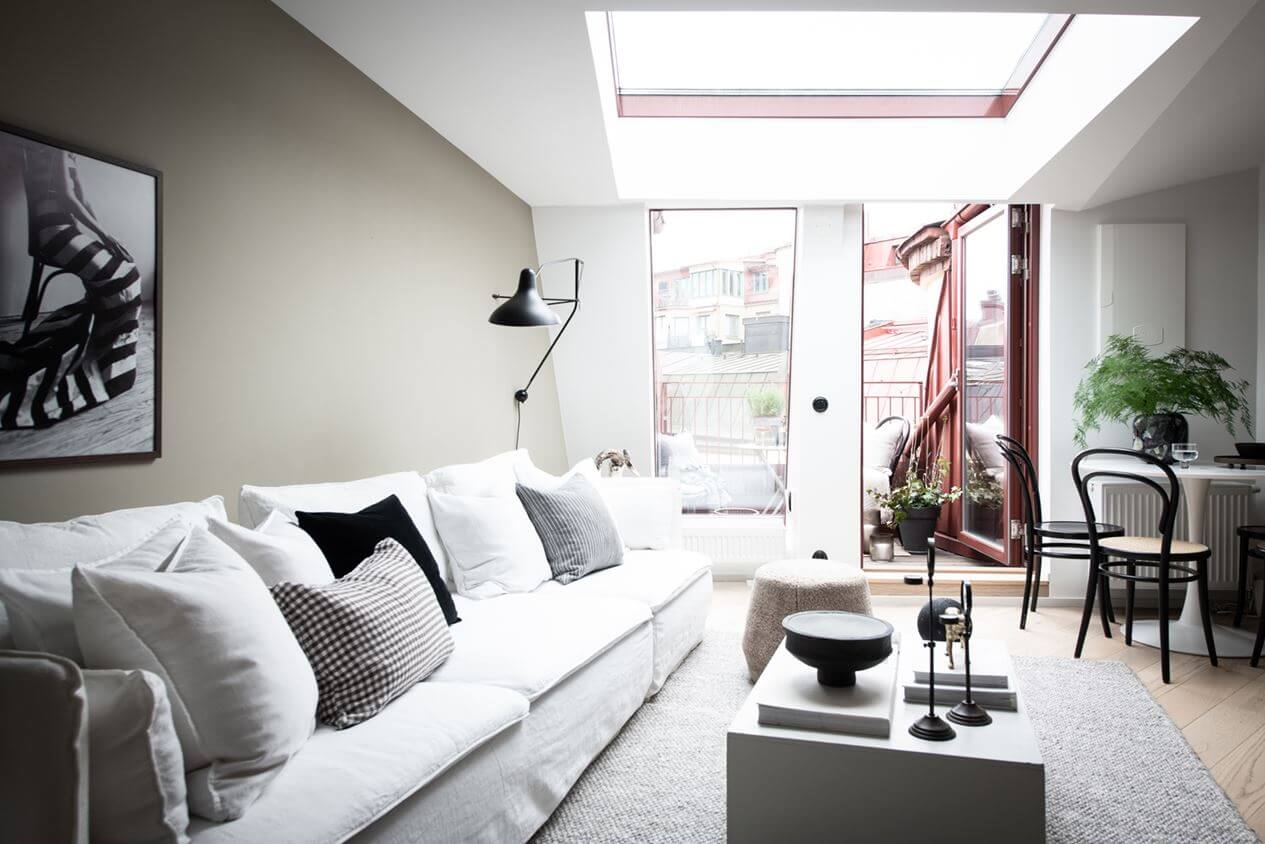 A Light Nordic Attic Loft with Raw Walls and Skylights 2 scandinavian-attic-apartment-large-skylight-nordic-design-nordroom