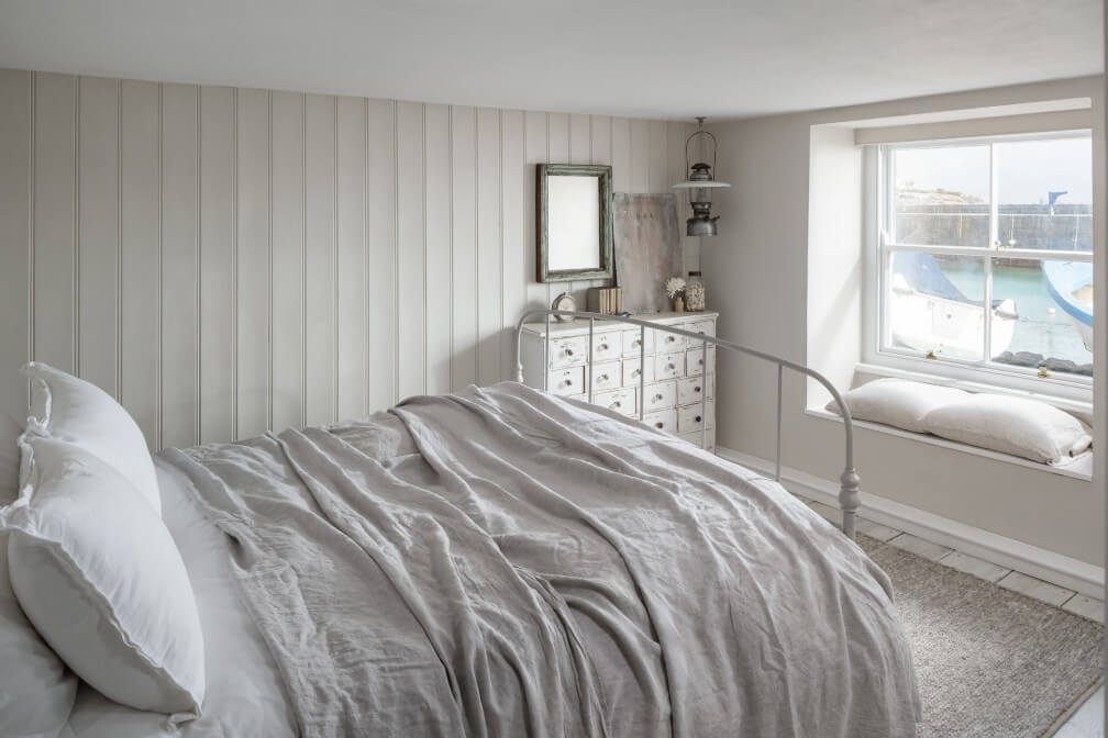 A Beautiful Seaside Cottage in Cornwall 13 serene-cottage-bedroom-window-seat-nordroom