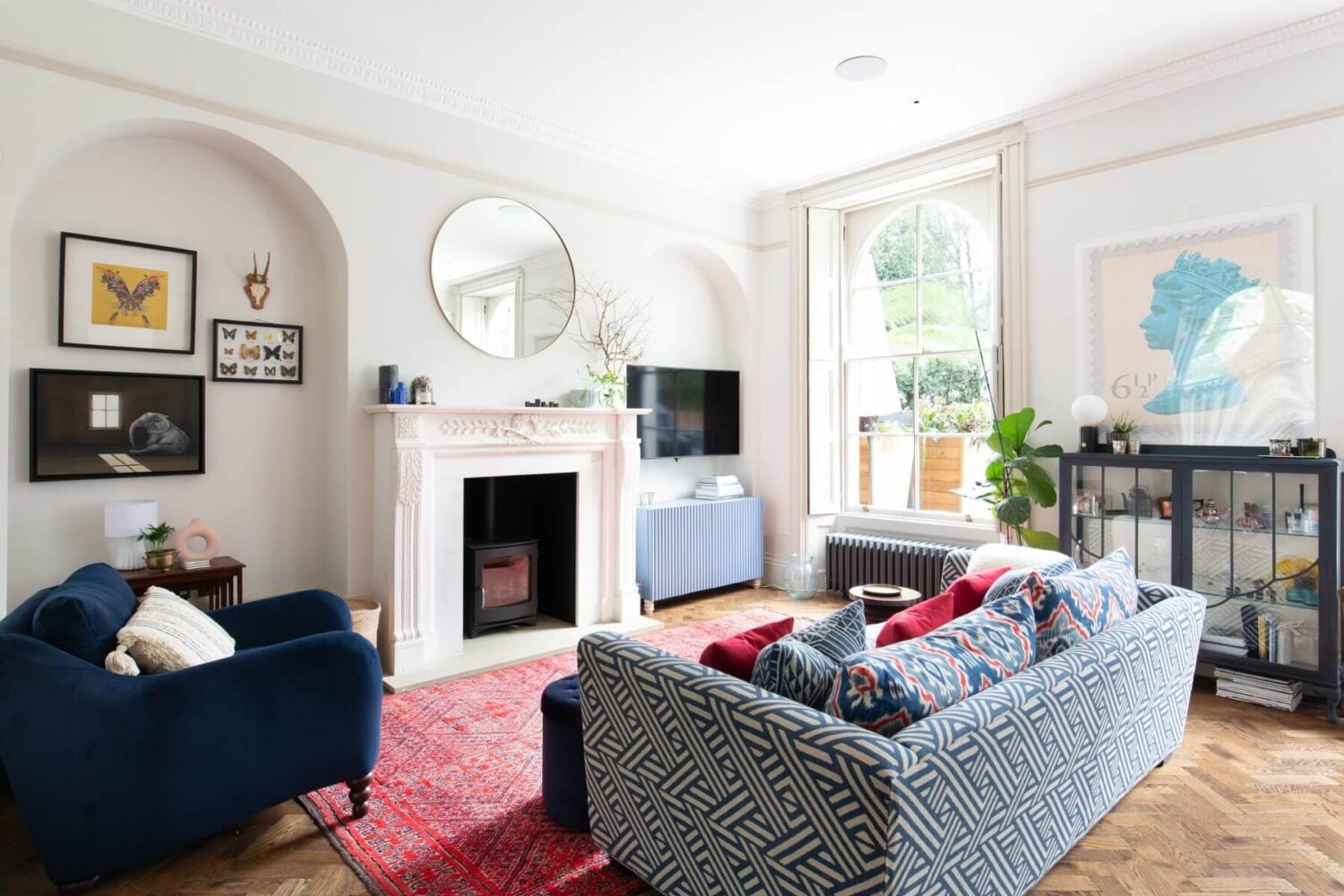 A Colorful Georgian Home in London 7 sitting-room-arched-wooden-floor-pink-rug-fireplace-nordroom