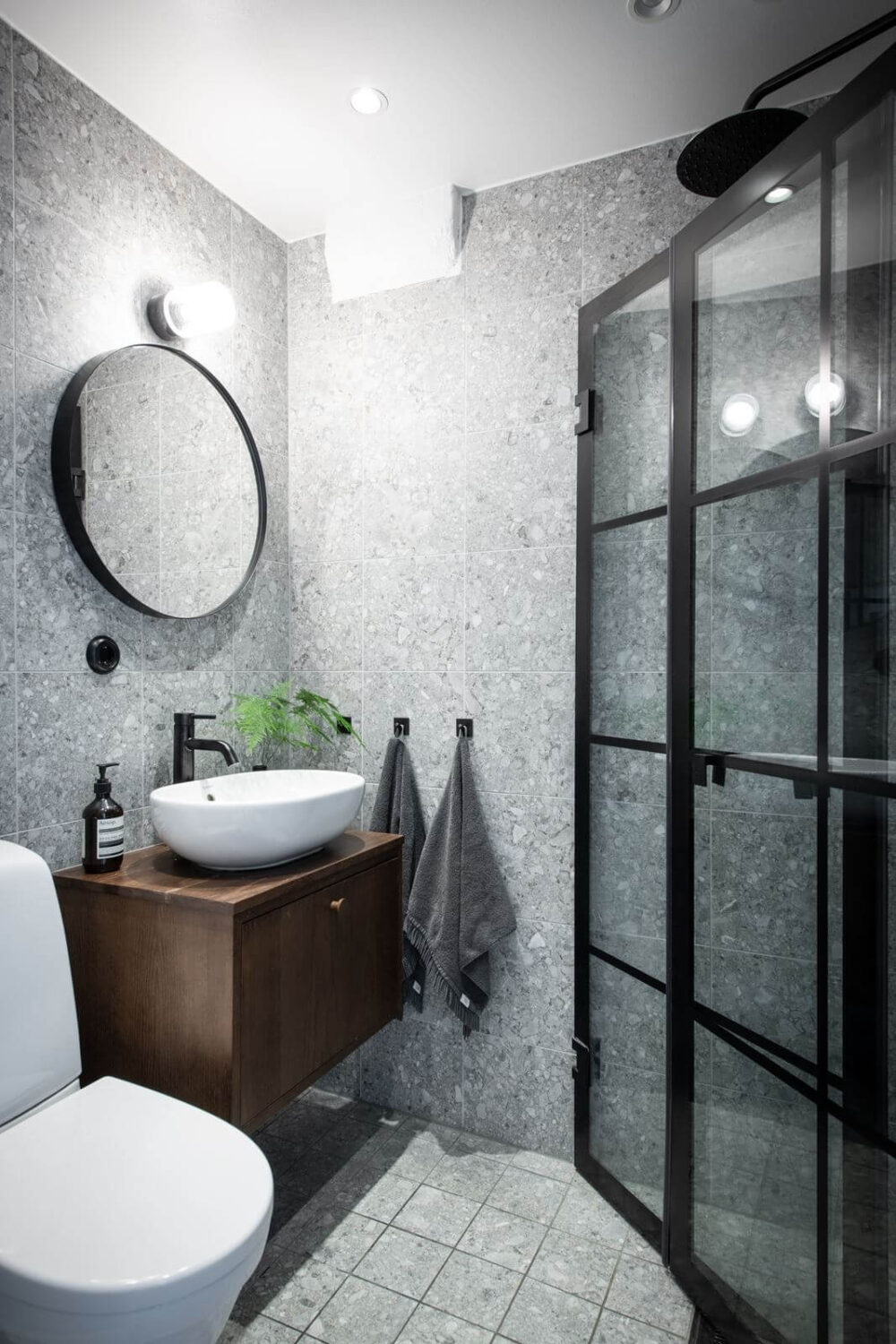 A Light Nordic Attic Loft with Raw Walls and Skylights 15 small-gray-bathroom-walnut-vanity-industrial-shower-door-nordroom