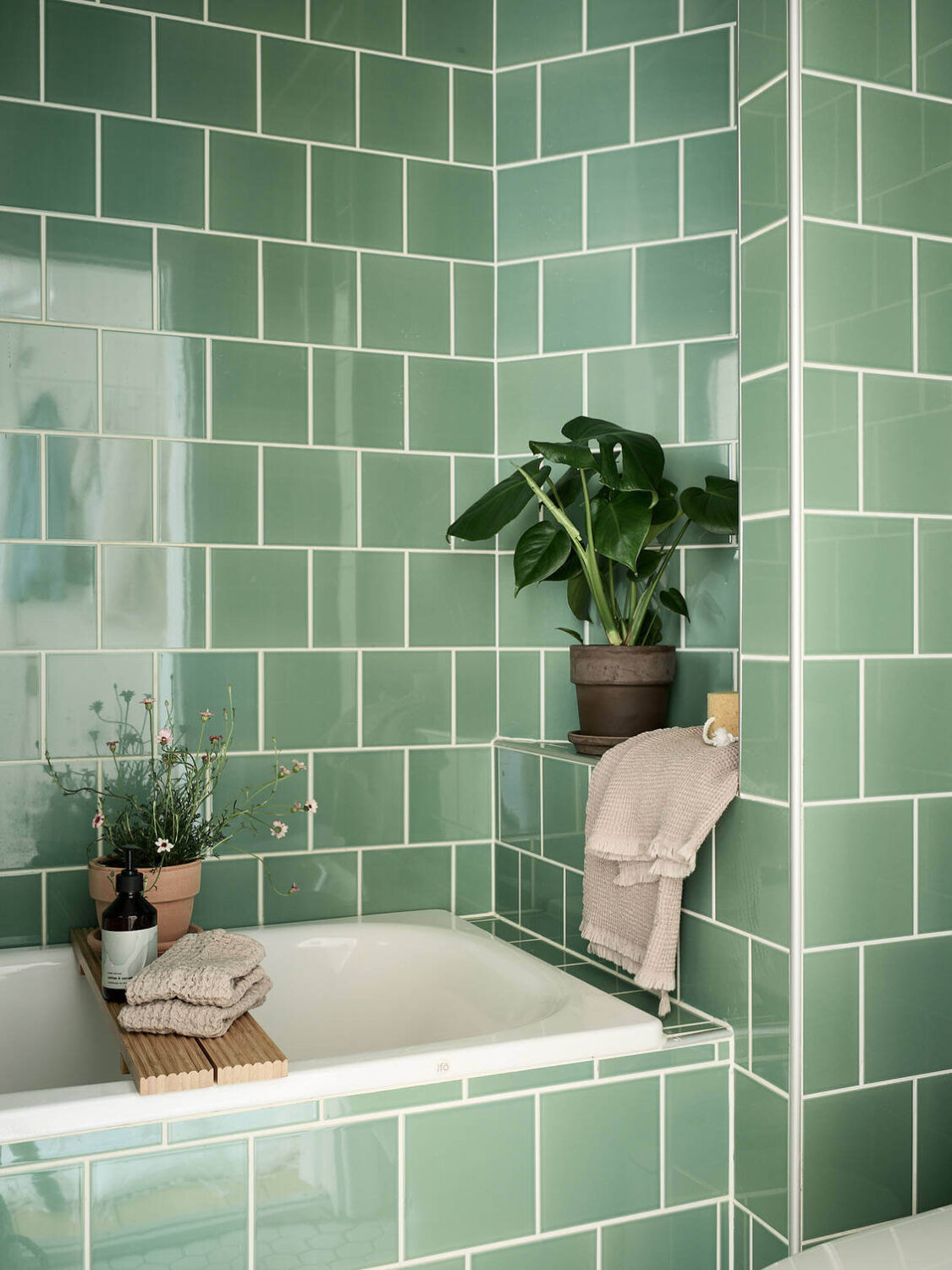 A Pink Studio Apartment with Green Bathroom 14 small-green-bathroom-bath-green-tiles-nordroom