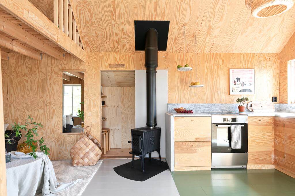 A Red Wooden Cottage on a Swedish Allotment 6 small swedish cottage kitchen green painted floor nordroom A Red Wooden Cottage on a Swedish Allotment