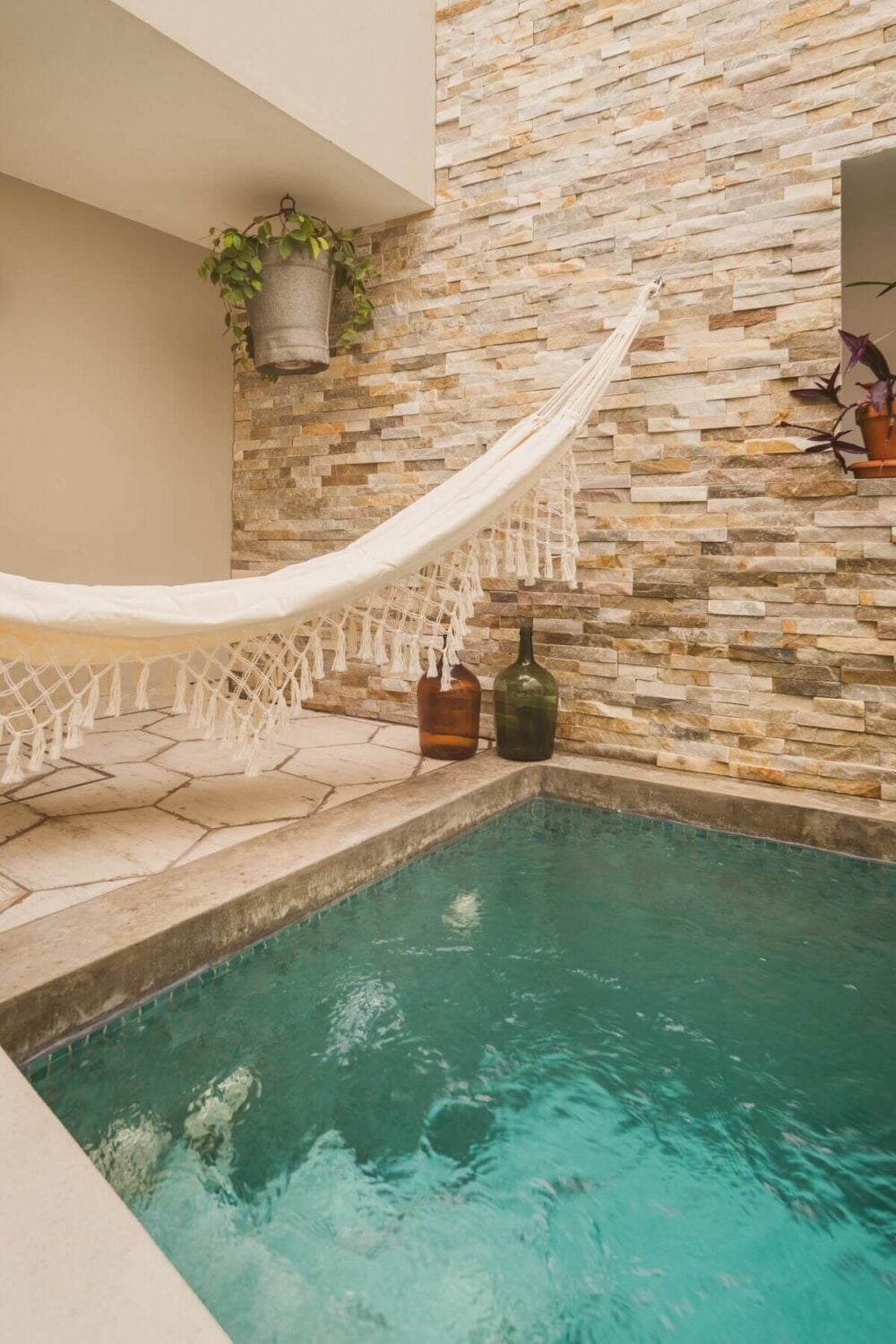 A Serene Airbnb Home with Patio in Lagos, Portugal 16 small-swimming-pool-hammock-airbnb-portugal-nordroom