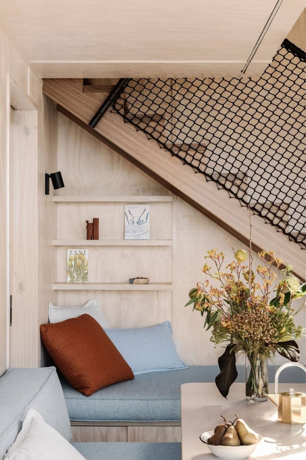 A Small Modern Seaside Retreat in Australia 8 sofa-shelves-small-home-airbnb-australia-nordroom
