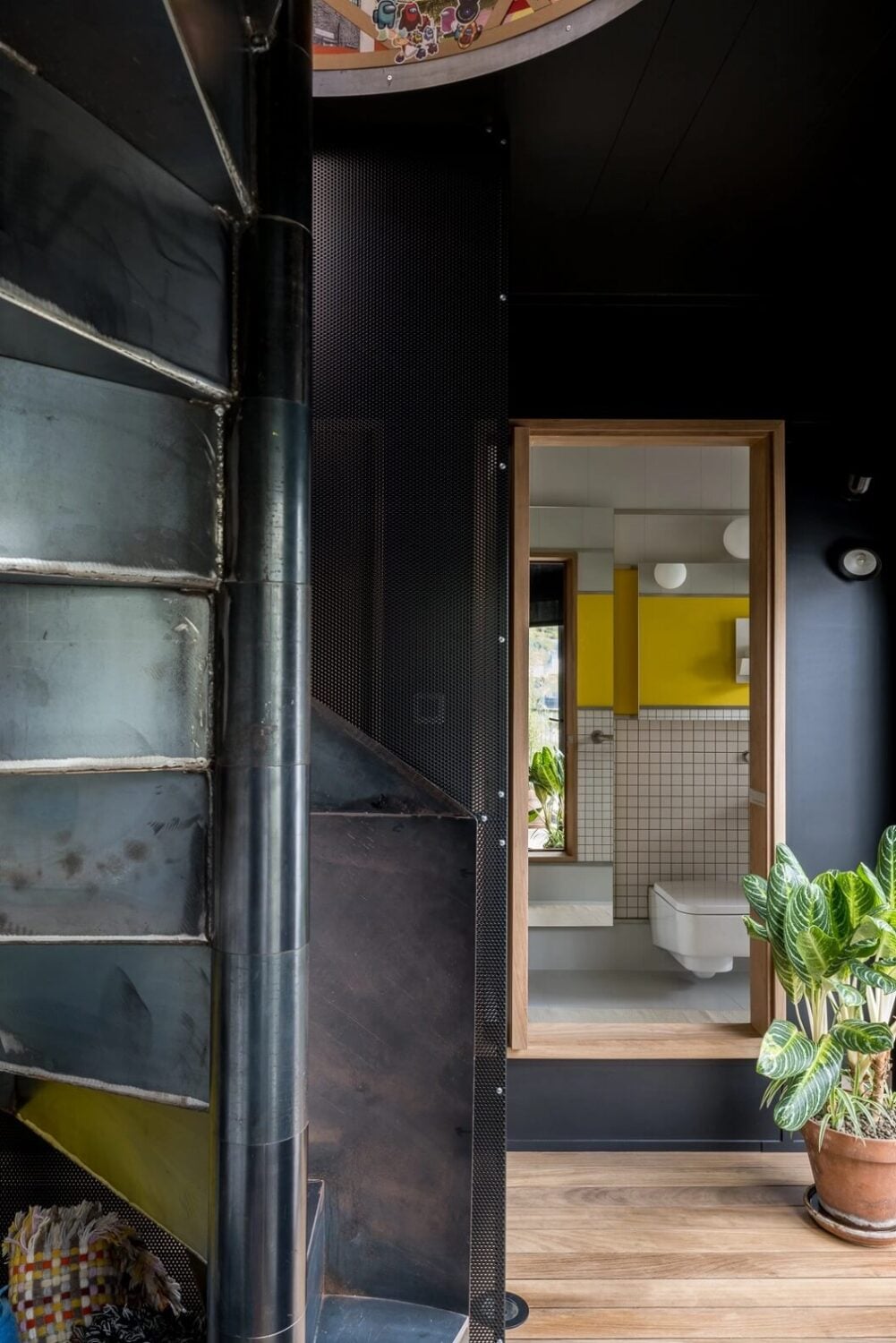 A Spectacular Modern Black Loft in London 16 spiral-steel-staircase-modern-black-loft-london-nordroom