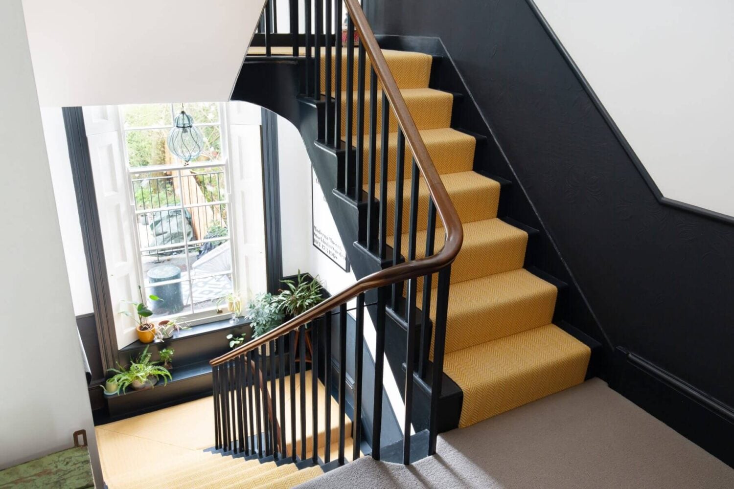 A Colorful Georgian Home in London 10 staircase-black-wood-panels-nordroom