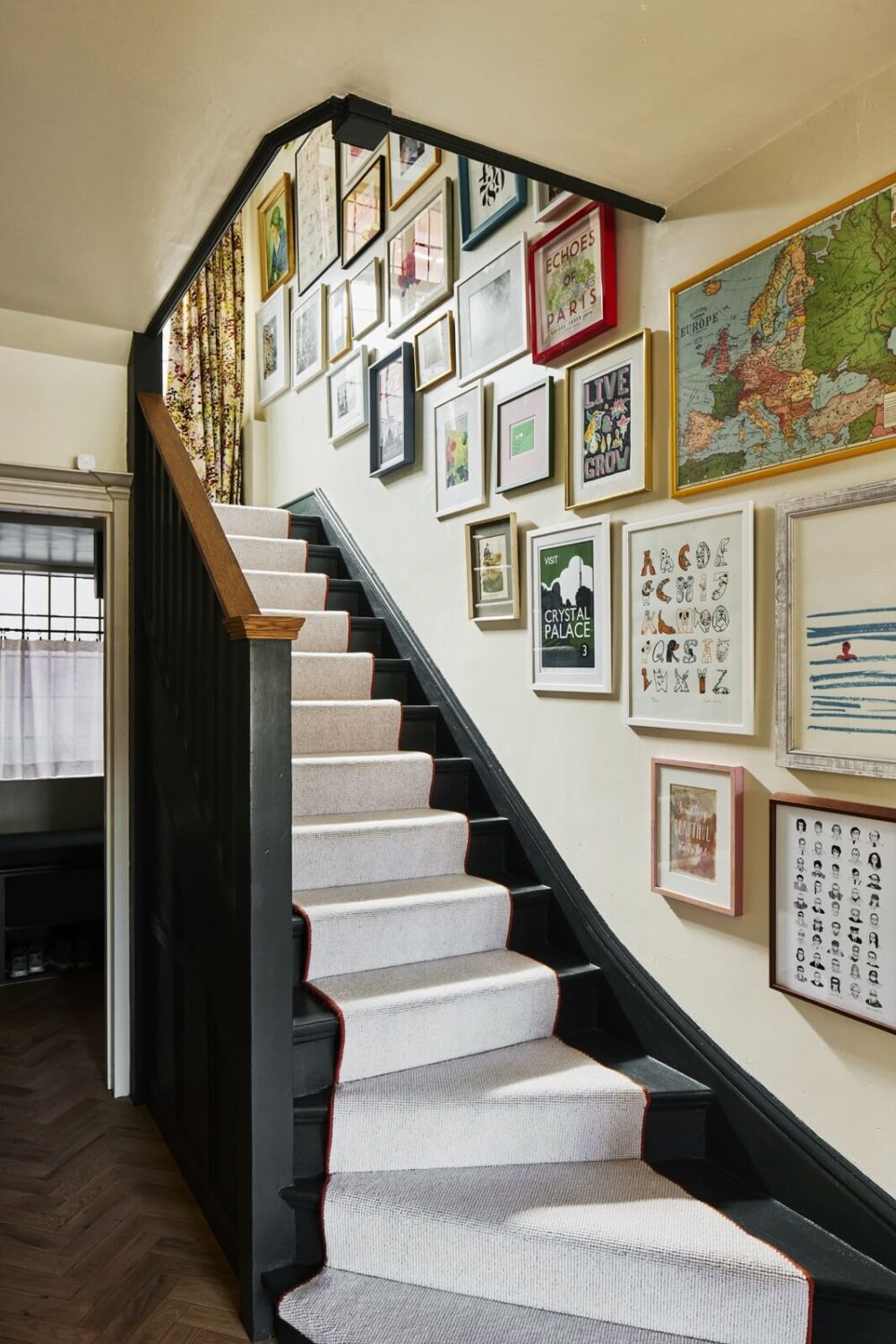 An Arts and Crafts House with Colorful Rooms 17 staircase-gallery-wall-nordroom