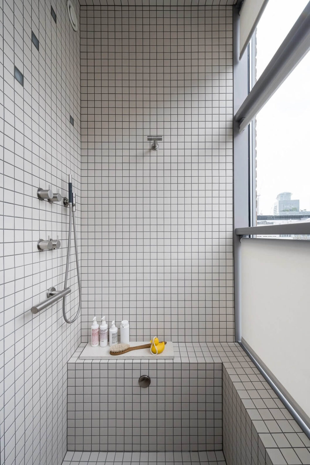 A Spectacular Modern Black Loft in London 19 tiled-walk-in-shower-bench-nordroom