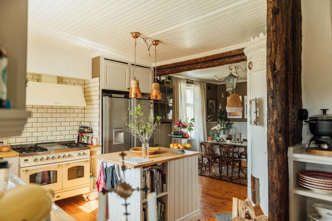 A Vintage Bohemian Country House in Sweden 5 vintage-bohemian-kitchen-exposed-wooden-beam-nordroom