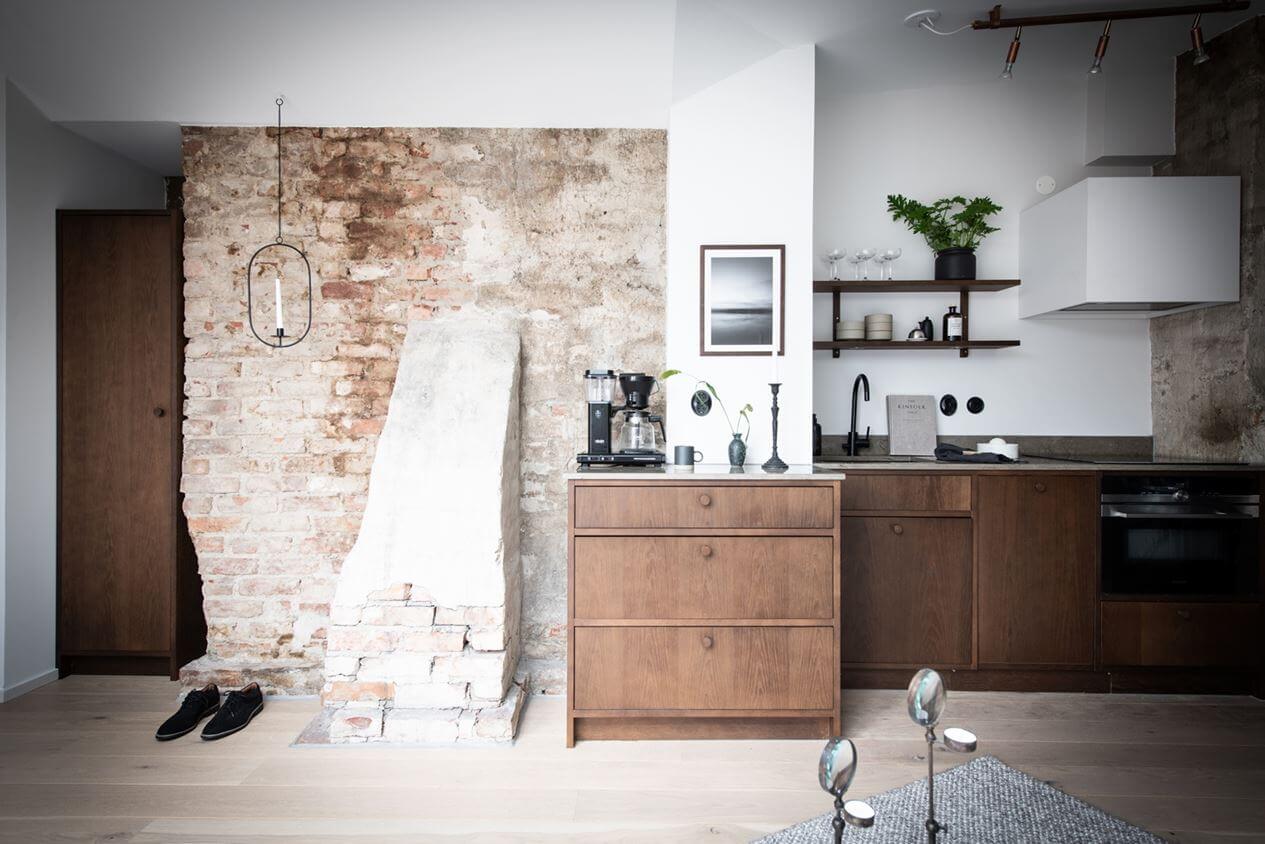 A Light Nordic Attic Loft with Raw Walls and Skylights 8 walnut-kitchen-penthouse-apartment-sweden-nordroom