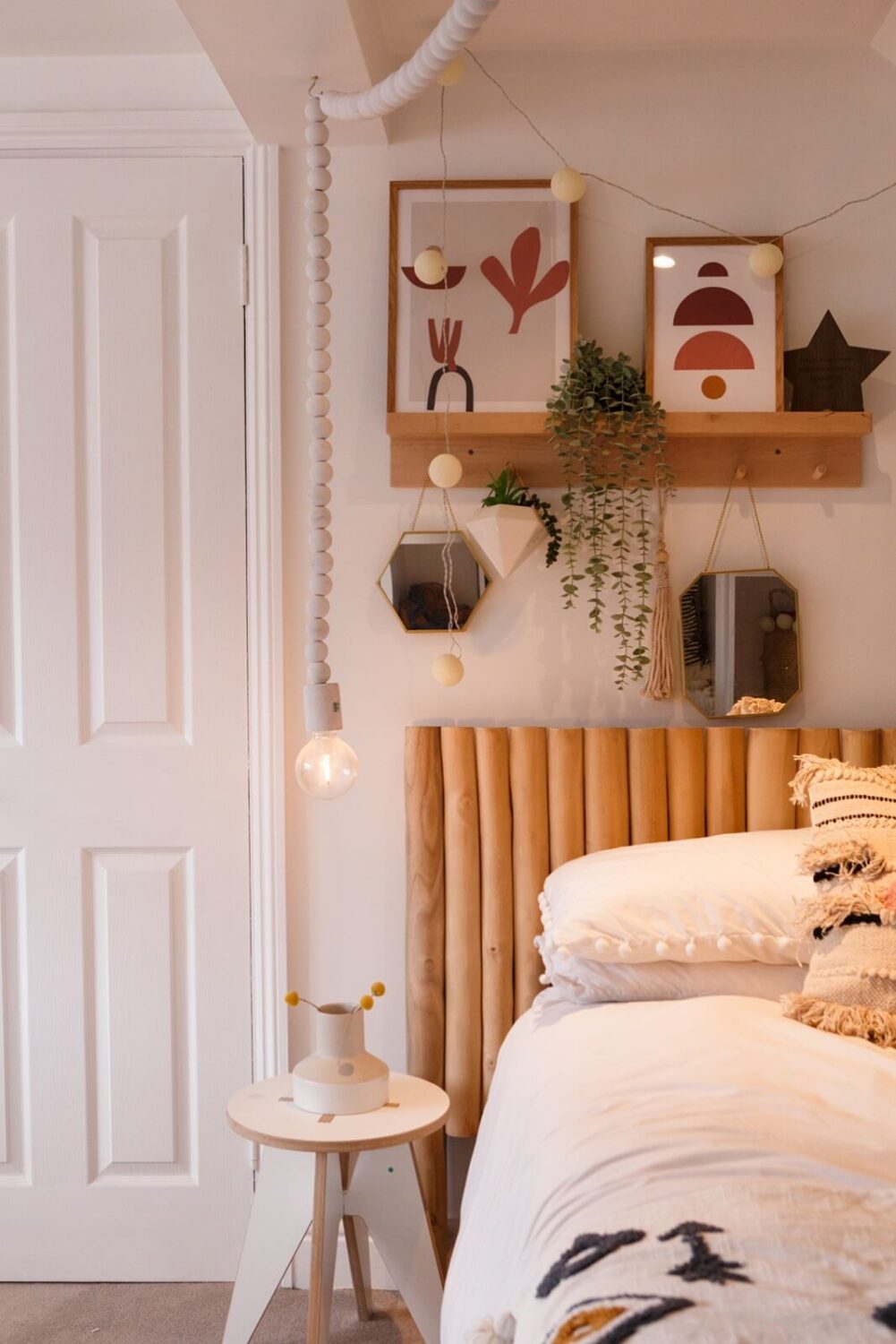A Colorful Maximalist Home in London 41 wooden-headboard-cozy-attic-bedroom-nordroom