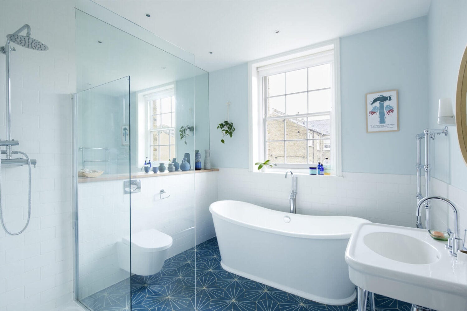 This Georgian Home in London Uses Blue as Accent Color 15 bathroom-dark-blue-geometric-floor-tiles-blue-walls-freestanding-bath-nordroom