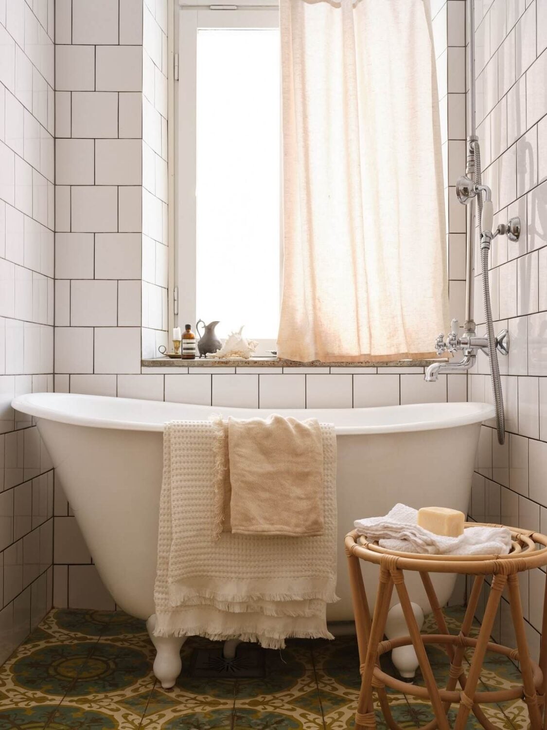 A Light Nordic Home with Ochre Yellow Kitchen 22 bathroom-small-freestanding-bath-moroccan-tiles-nordroom