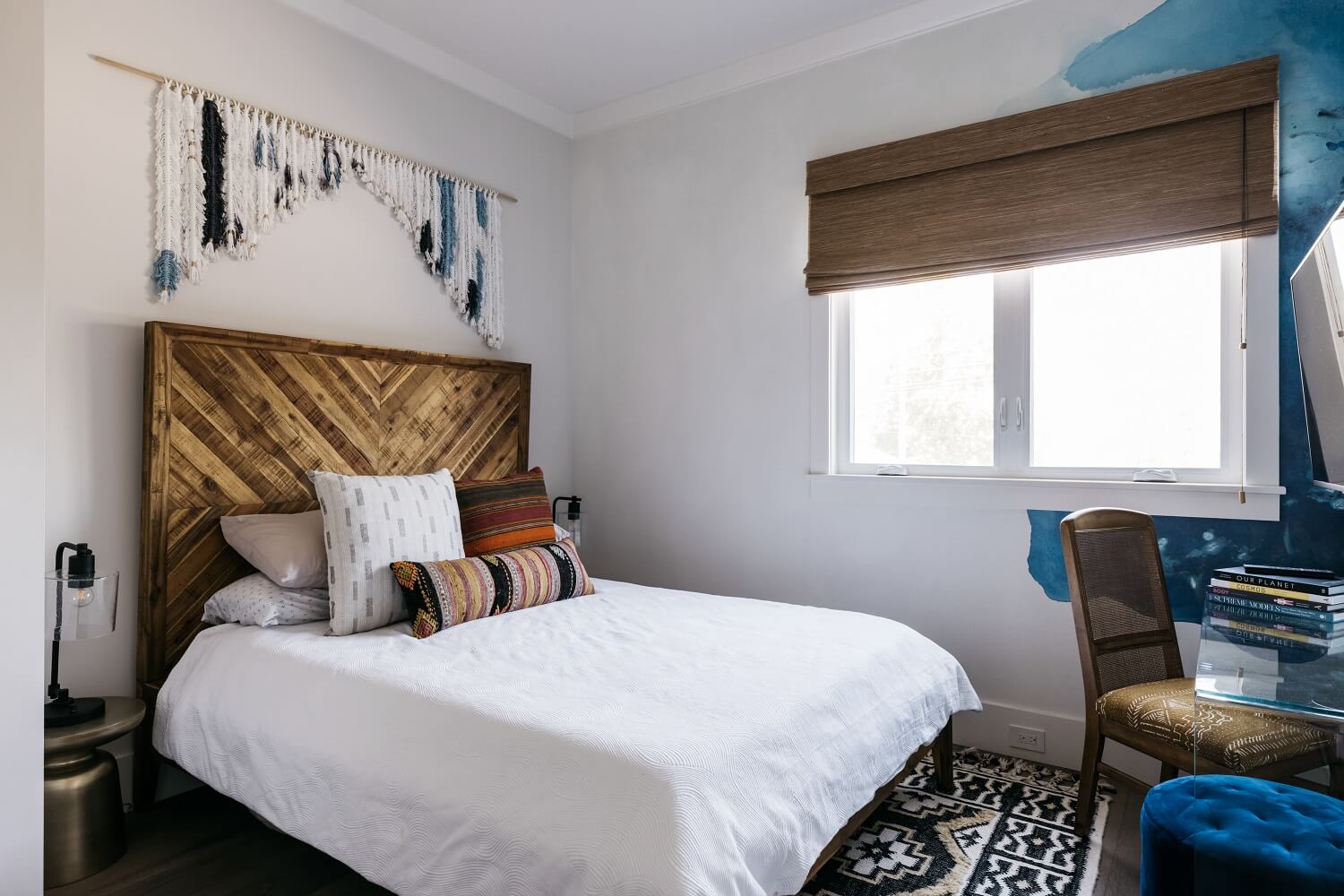 The Los Angeles Home of Emmy Raver-Lampman and Daveed Diggs 22 bedroom-blue-mural-clear-desk-bohemian-daveed-diggs-emmy-raver-lampman-nordroom