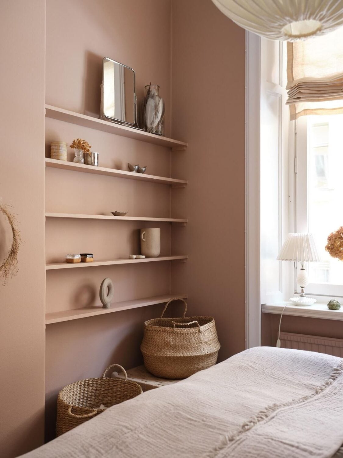 A Light Nordic Home with Ochre Yellow Kitchen 16 bedroom-pink-walls-narrow-shelves-nordroom