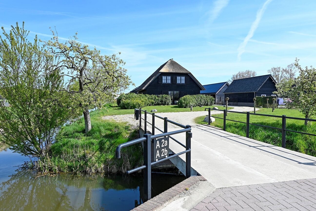 A Dutch Country Home with a Tiny House in the Garden 24 black-exterior-entrance-country-house-netherlands-nordroom