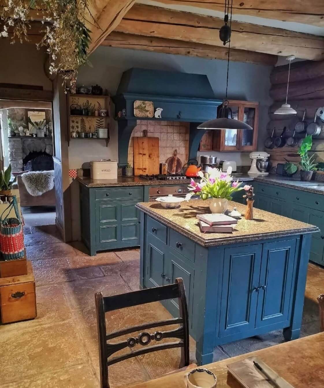 Imrich Lodge: A Cozy Self-Built Log House in the Scottish Highlands 6 blue-kitchen-cabinets-island-country-style-log-house-scotland-nordroom