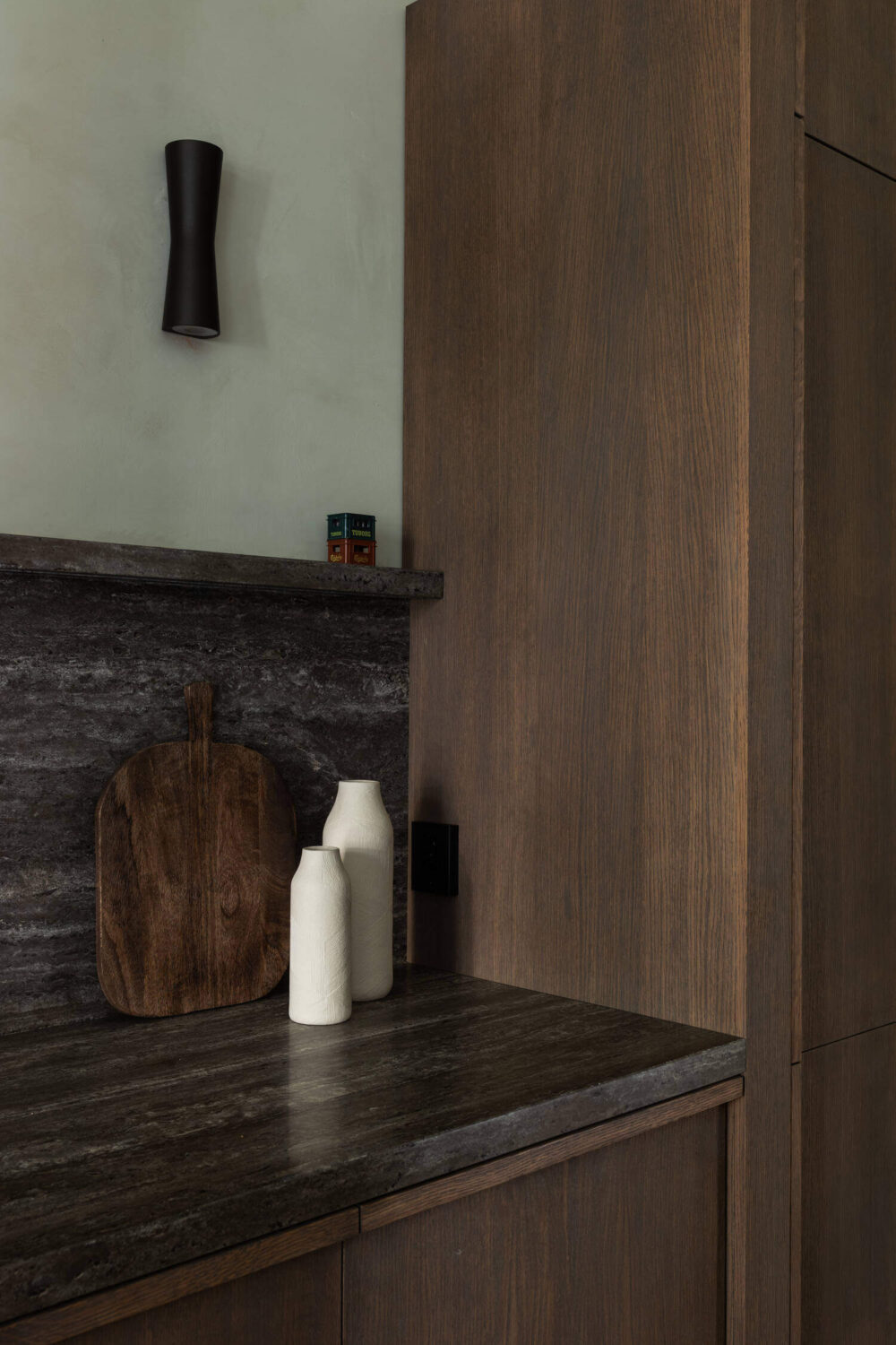 Japandi Interior Design in a Small Nordic Home 12 dark-custom-made-kitchen-black-worktop-nordroom