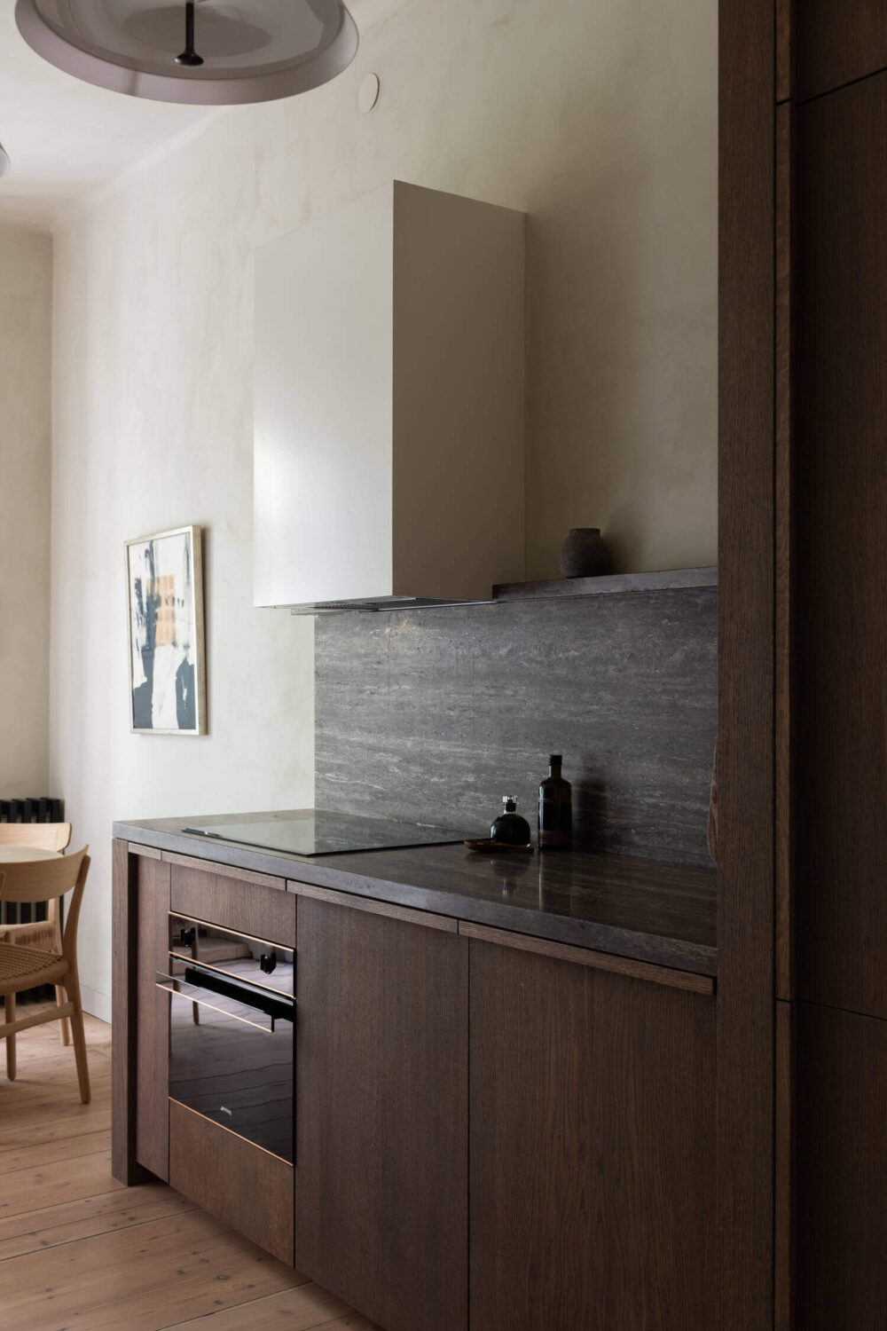 Japandi Interior Design in a Small Nordic Home 11 dark-wooden-kitchen-wabi-sabi-home-nordroom