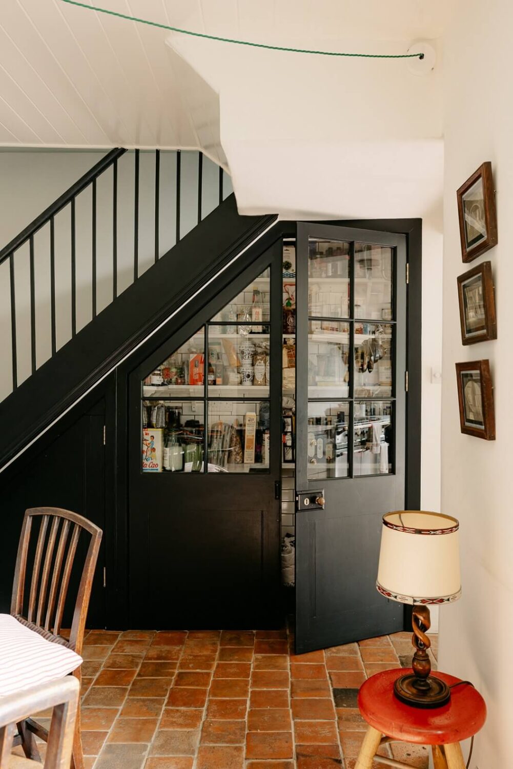 A Carefully Restored Victorian House in London 10 dining-room-built-in-cabinet-under-stairs-nordroom
