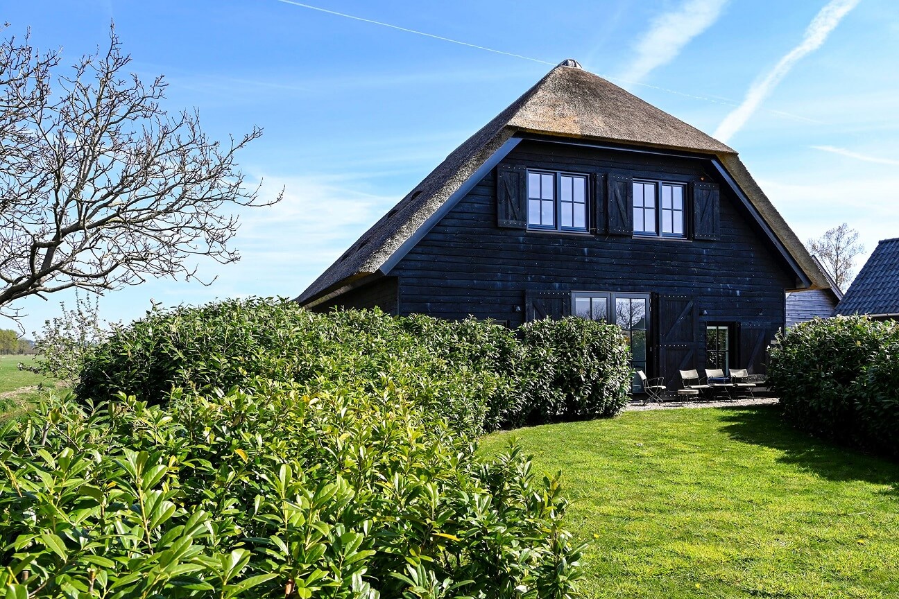 A Dutch Country Home with a Tiny House in the Garden 22 garden-black-wooden-exterior-nordroom
