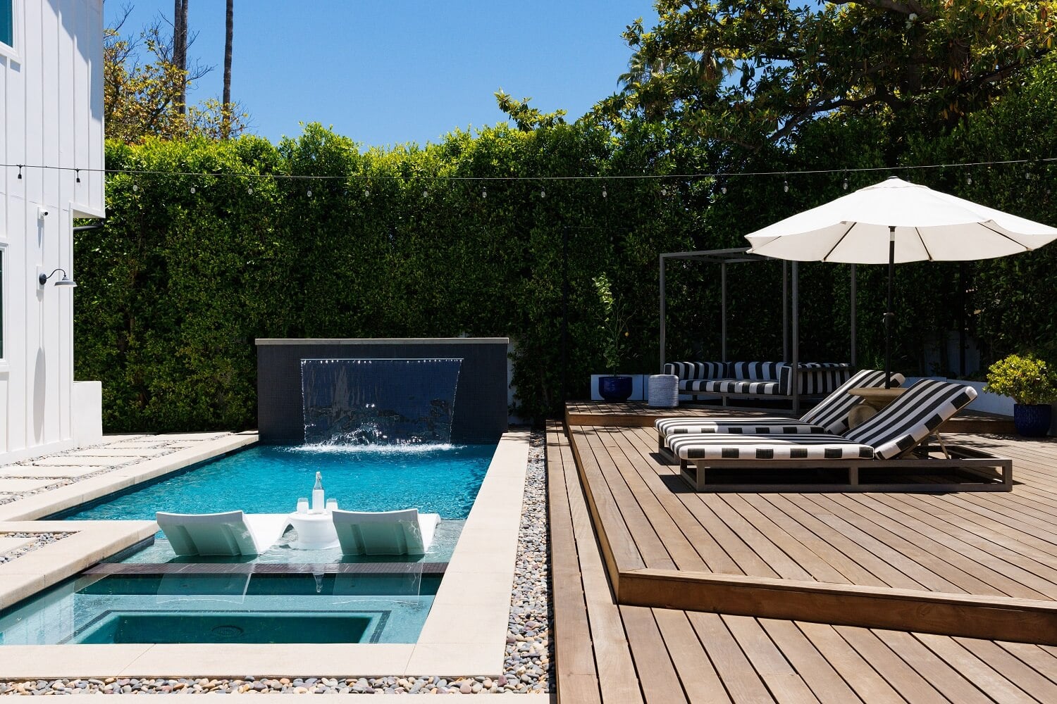 The Los Angeles Home of Emmy Raver-Lampman and Daveed Diggs 28 garden-swimming-pool-wooden-terrace-los-angeles-home-daveed-diggs-emmy-raver-lampman-nordroom