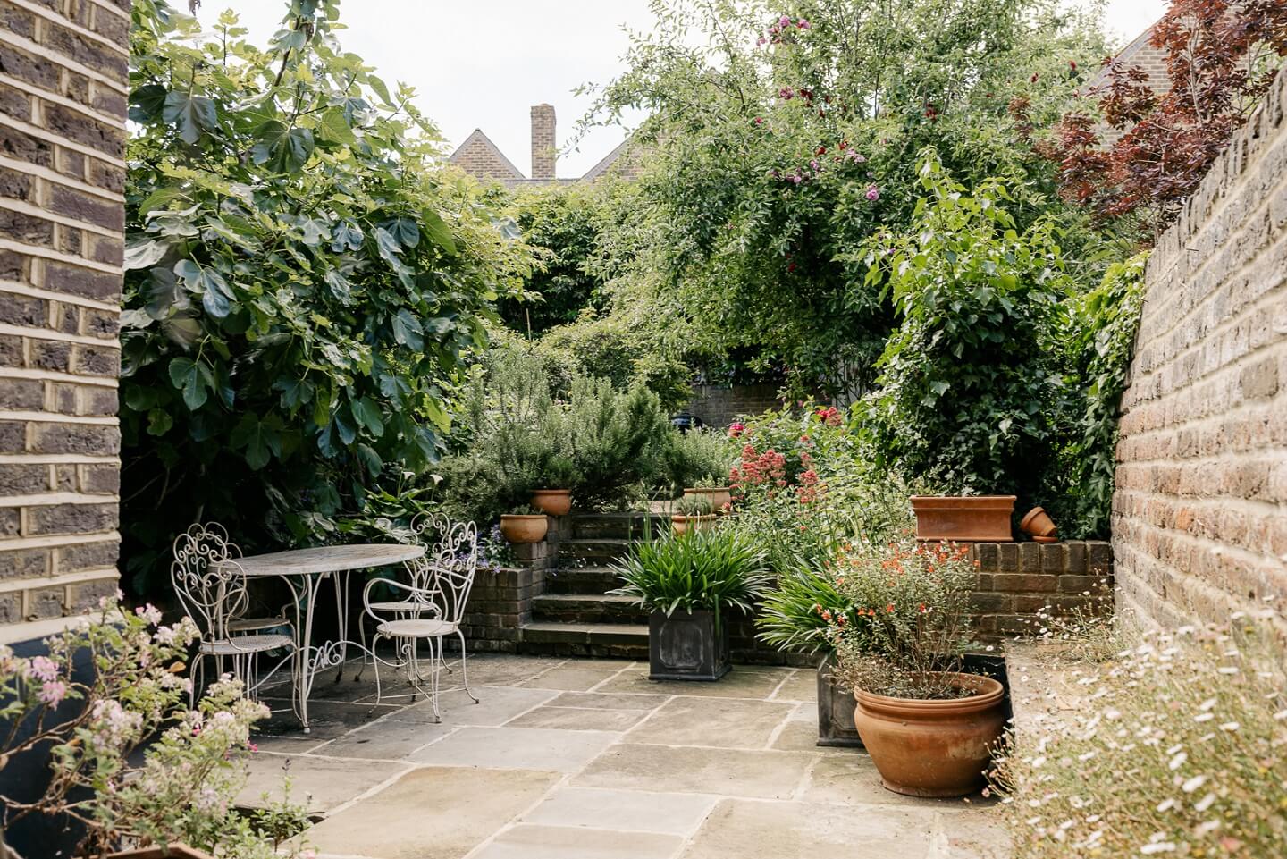 A Carefully Restored Victorian House in London 26 garden-terrace-greenery-london-townhouse-nordroom