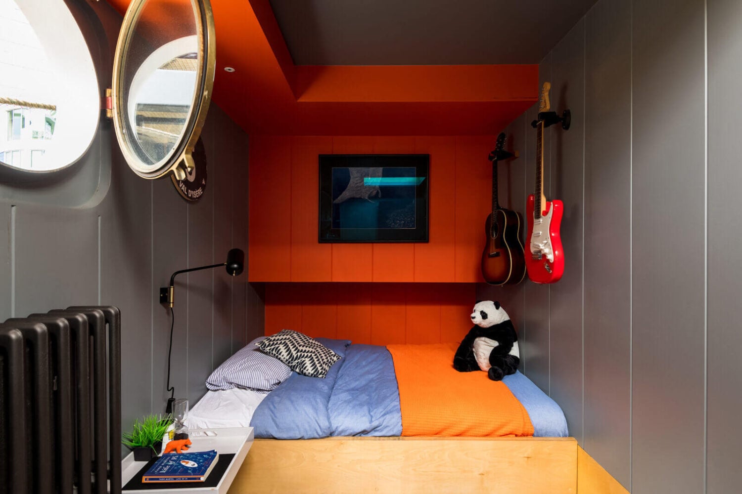 A Houseboat in London Fit For A Family 13 gray-orange-kids-bedroom-round-window-houseboat-london-nordroom