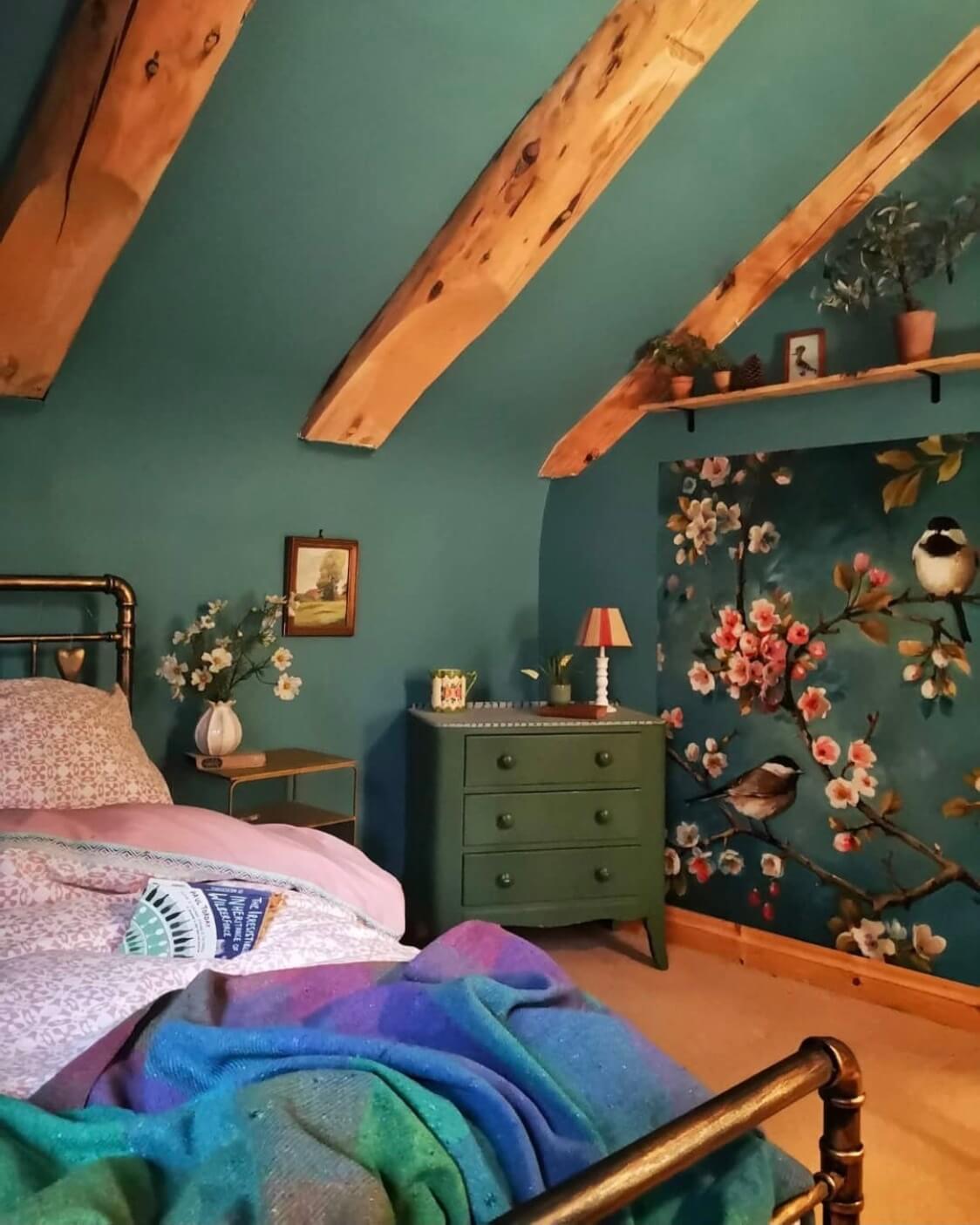 Imrich Lodge: A Cozy Self-Built Log House in the Scottish Highlands 11 green-bedroom-exposed-beams-log-house-floral-art-nordroom