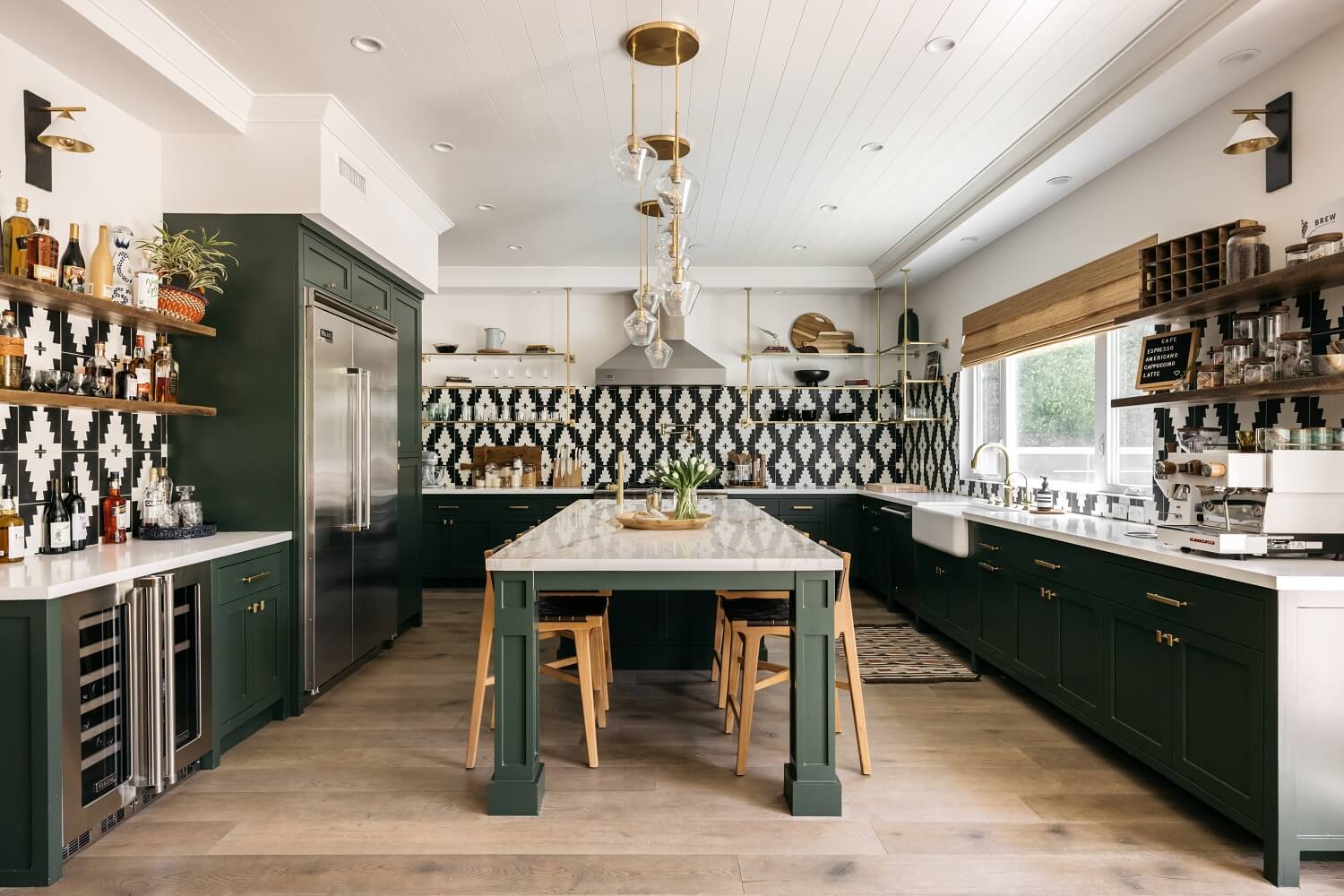 The Los Angeles Home of Emmy Raver-Lampman and Daveed Diggs 4 green-kitchen-island-geometric-tiles-open-shelves-daveed-diggs-emmy-raver-lampman-nordroom