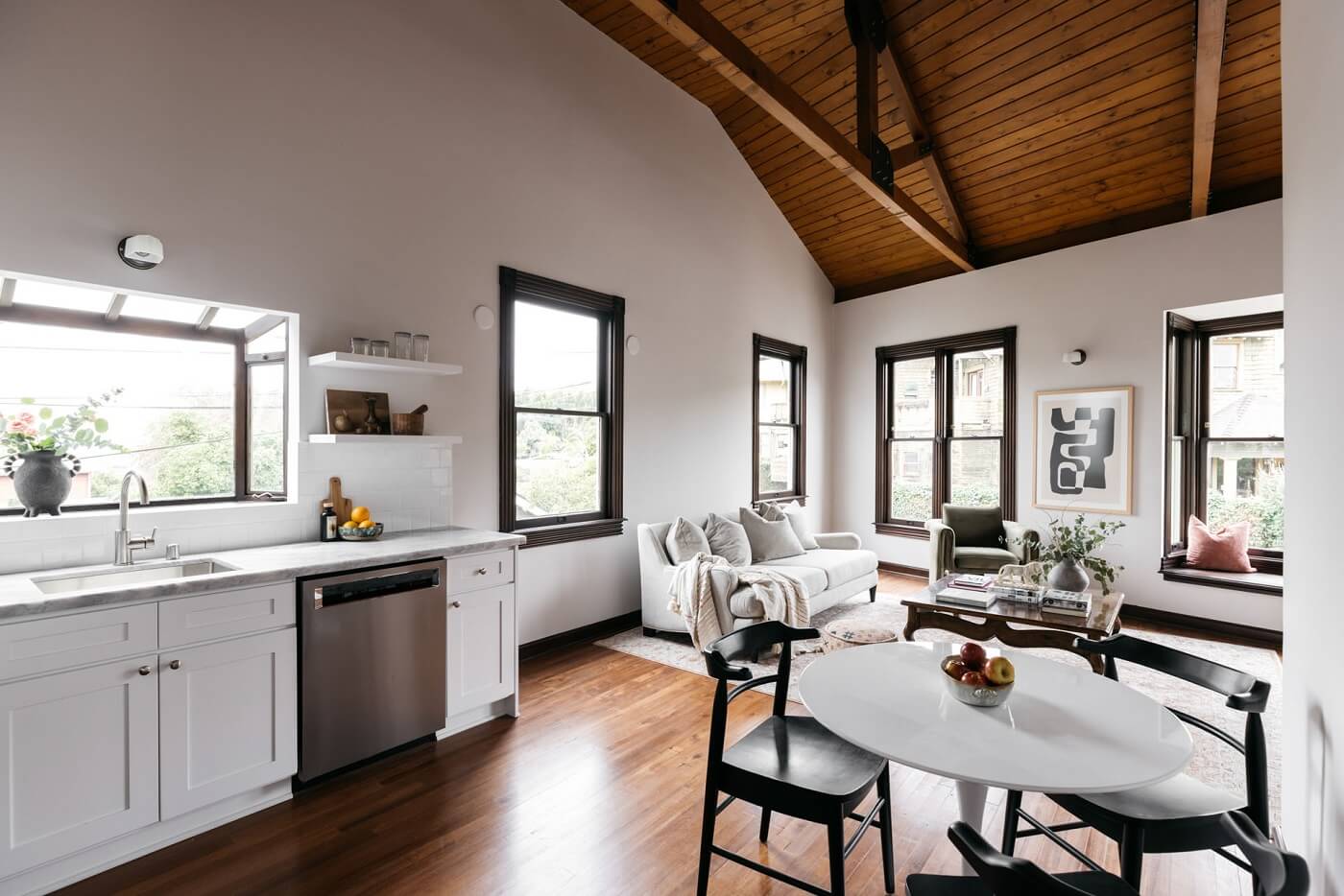 A Carefully Restored Victorian House in Los Angeles 20 guest-house-kitchen-round-dining-table-wooden-ceiling-nordroom
