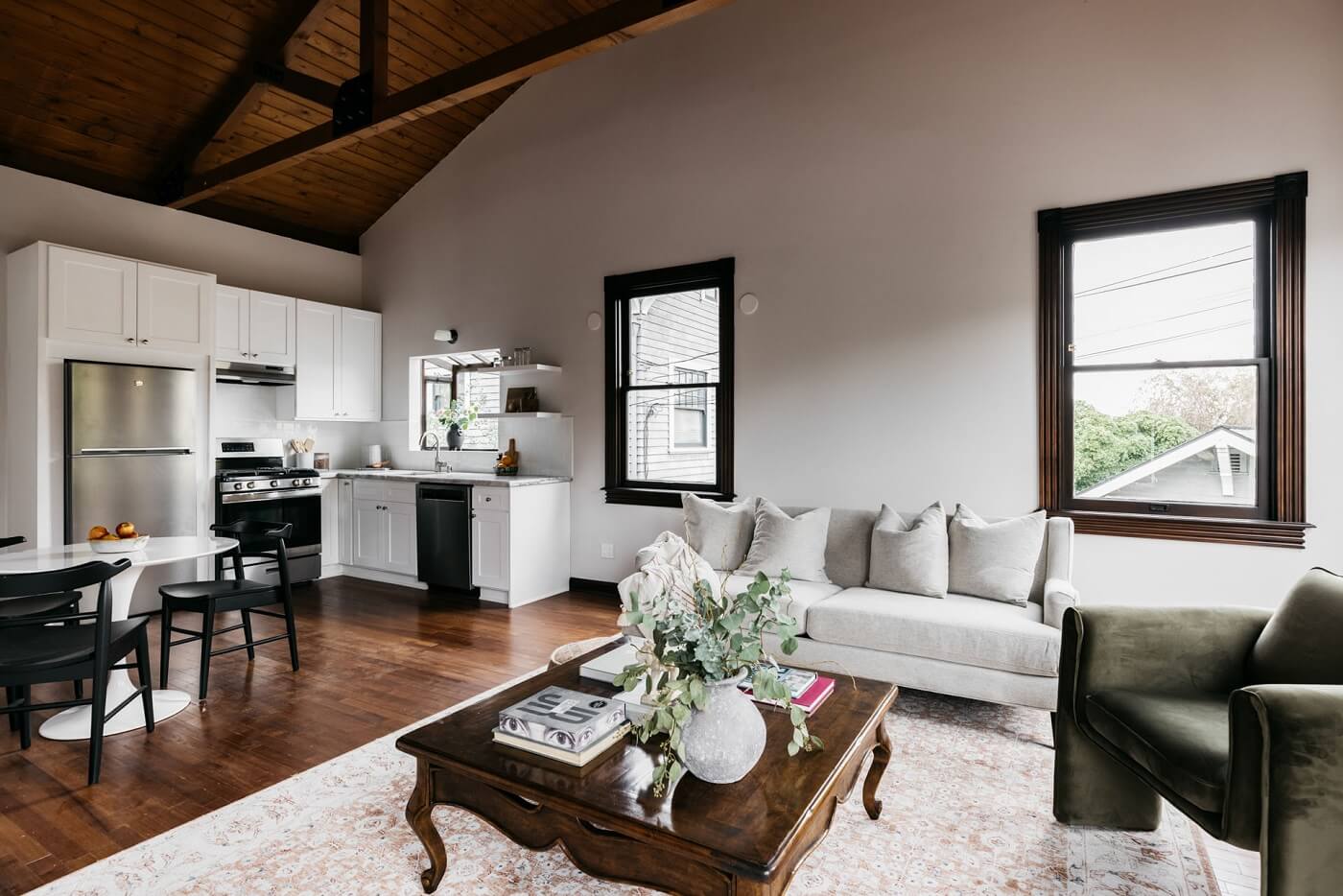 A Carefully Restored Victorian House in Los Angeles 21 guest-house-living-space-green-velvet-armchair-nordroom