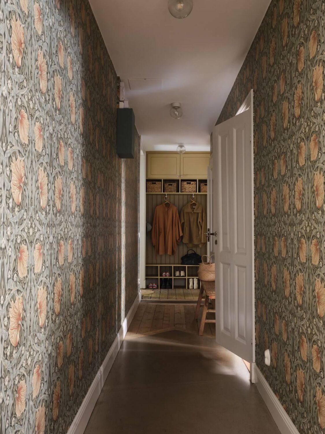 A Light Nordic Home with Ochre Yellow Kitchen 14 hallway-william-morris-wallpaper-nordroom