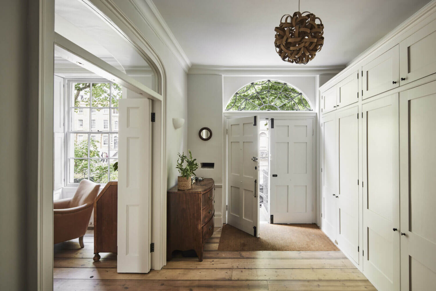 This Georgian Home in London Uses Blue as Accent Color 7 hallway-wooden-floor-built-in-cabinets-nordroom