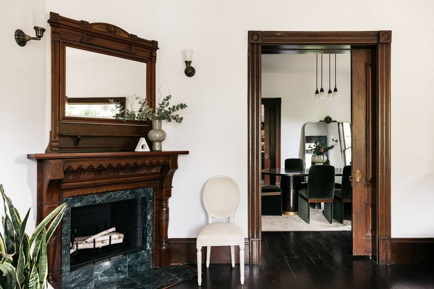 A Carefully Restored Victorian House in Los Angeles 9 historic-wooden-fireplace-nordroom