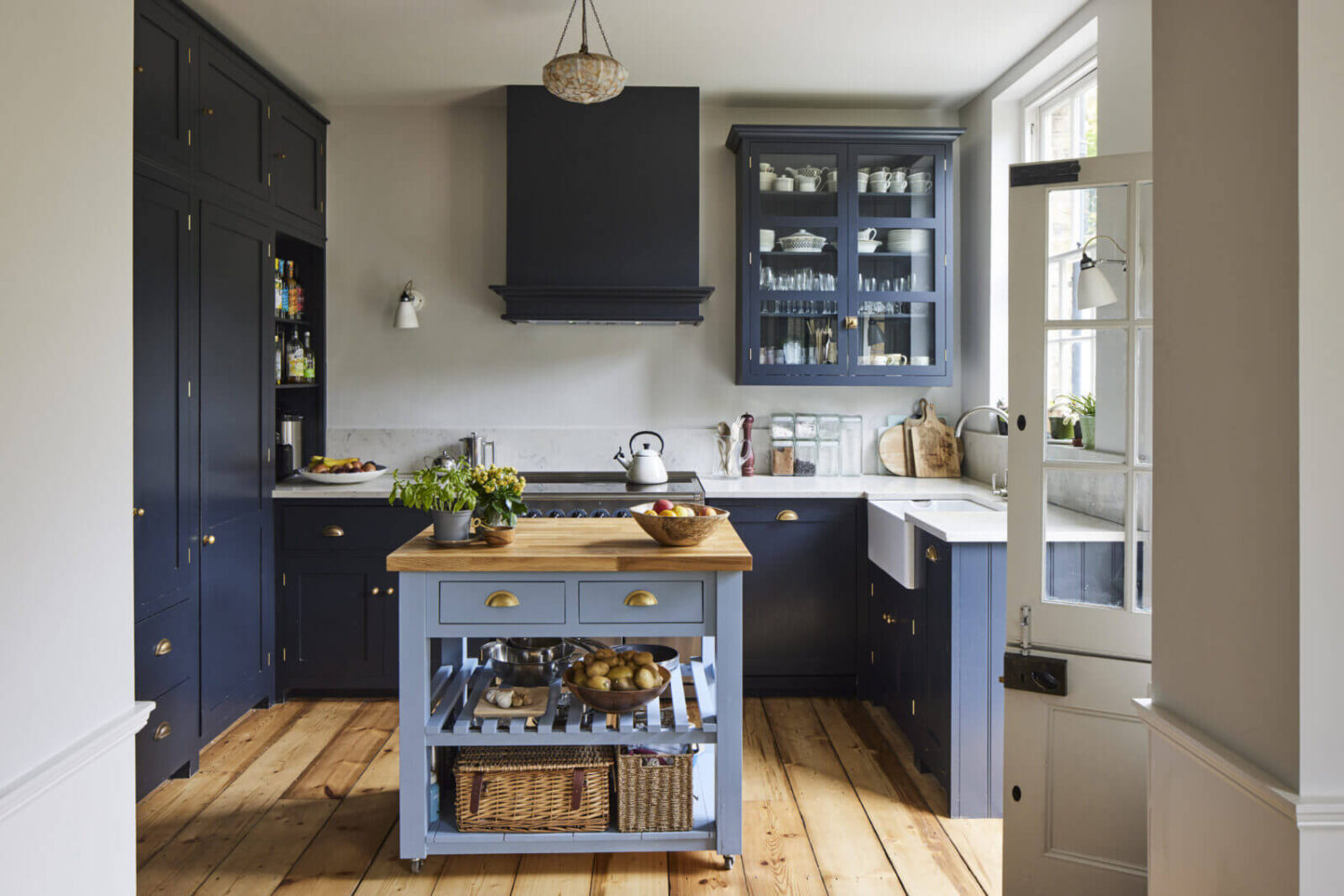 This Georgian Home in London Uses Blue as Accent Color 2 kitchen-blue-cabinets-wooden-floor-island-nordroom