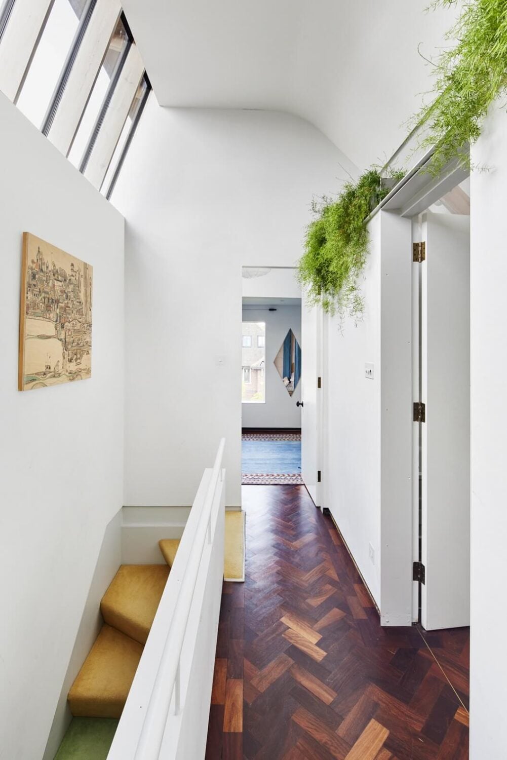 The Makers House: A Modern Achitectural Home in London 14 landing-mahogany-parquet-floor-colorful-stairs-nordroom