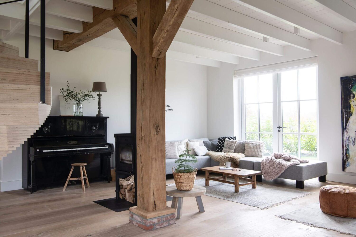 A Dutch Country Home with a Tiny House in the Garden 5 living-room-exposed-beams-gray-corner-sofa-nordroom