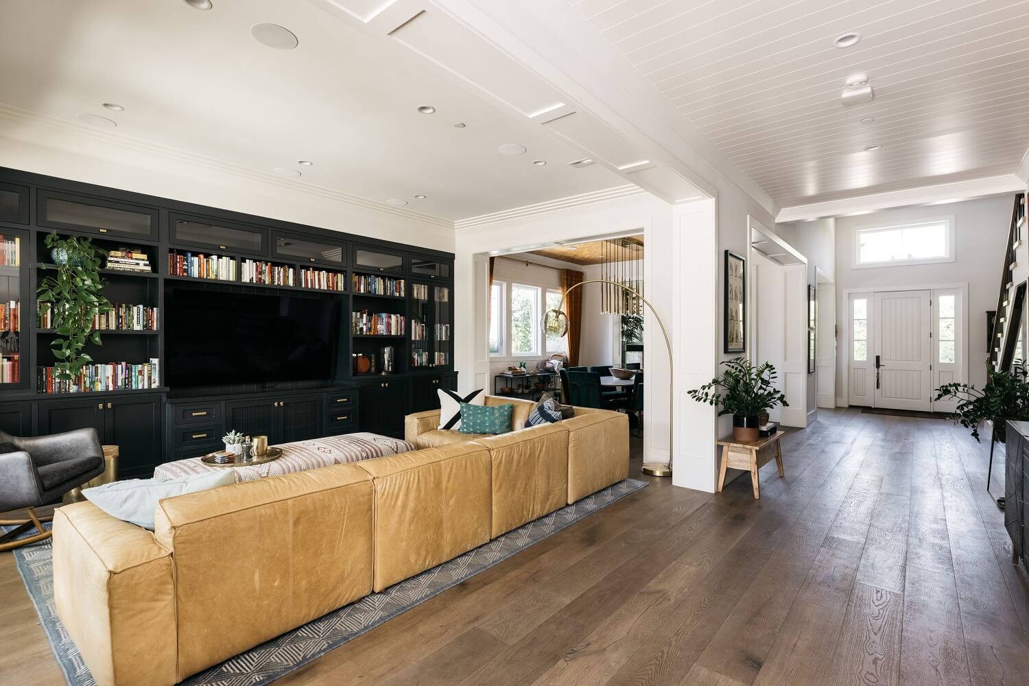 The Los Angeles Home of Emmy Raver-Lampman and Daveed Diggs 6 living-room-tv-room-built-in-cabinet-daveed-diggs-emmy-raver-lampman-nordroom