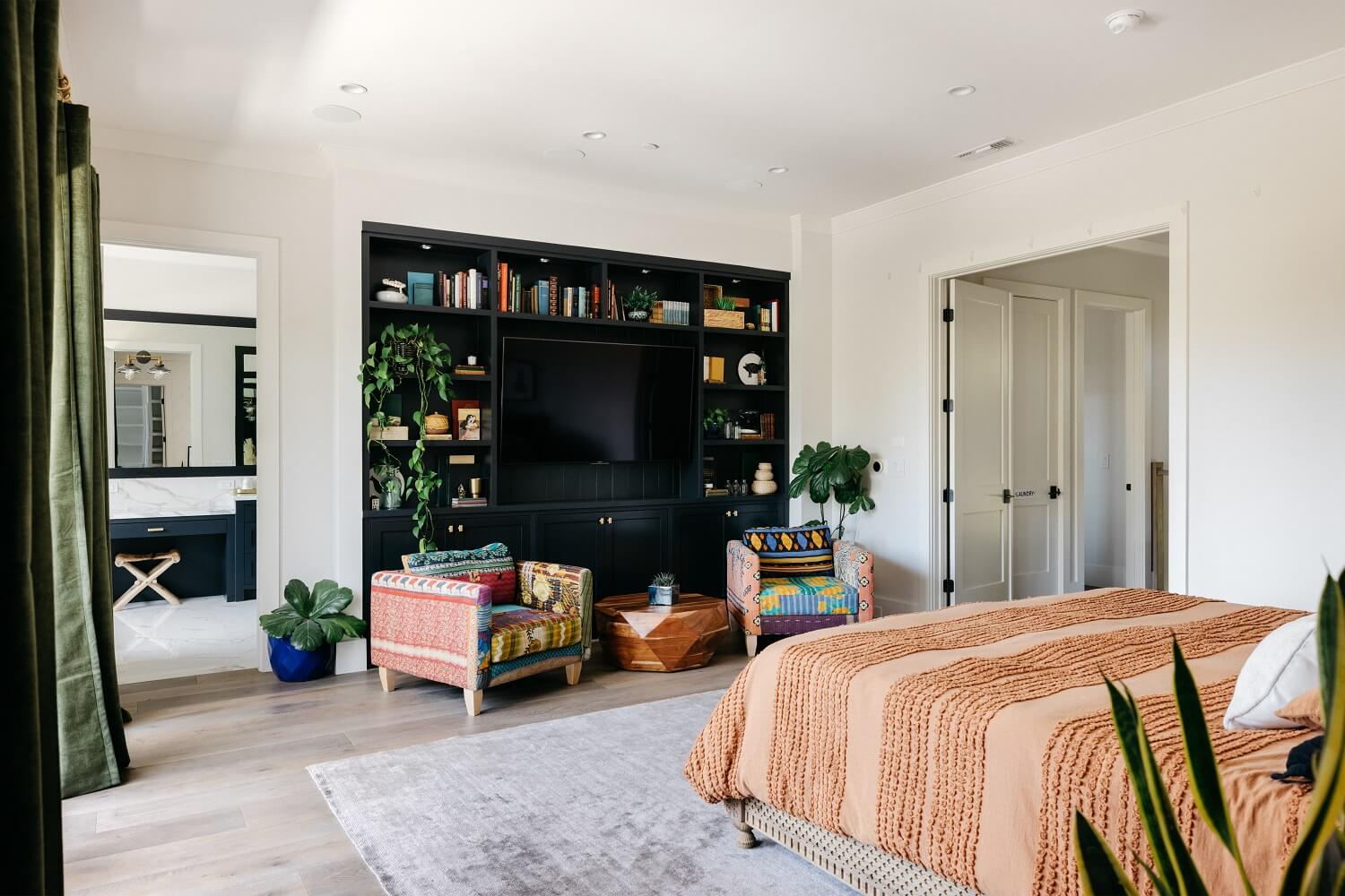 The Los Angeles Home of Emmy Raver-Lampman and Daveed Diggs 19 master-en-suite-bohemian-built-in-cabinet-nordroom