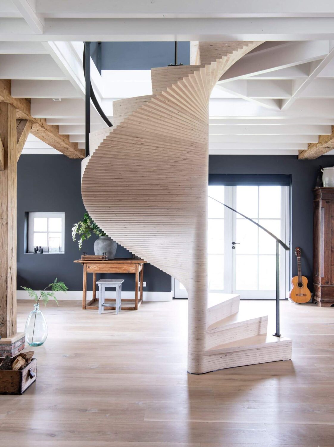 A Dutch Country Home with a Tiny House in the Garden 10 open-plan-living-room-spiral-staircase-nordroom