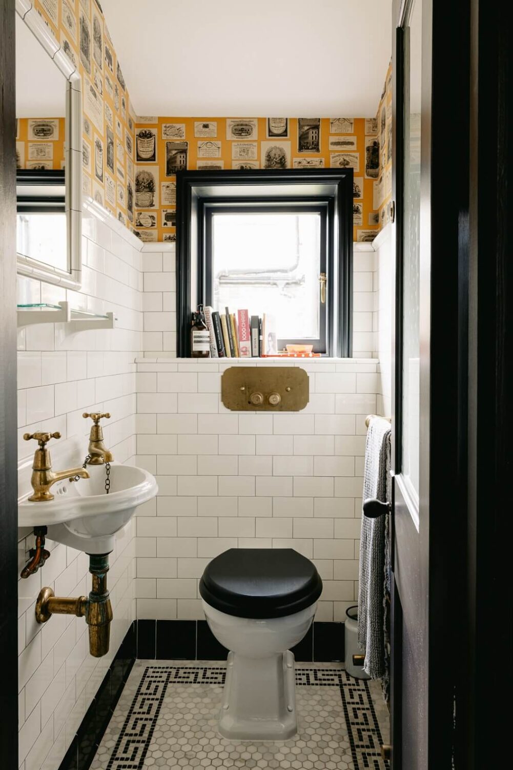 A Carefully Restored Victorian House in London 19 powder-room-yellow-wallpaper-restored-victorian-house-london-nordroom