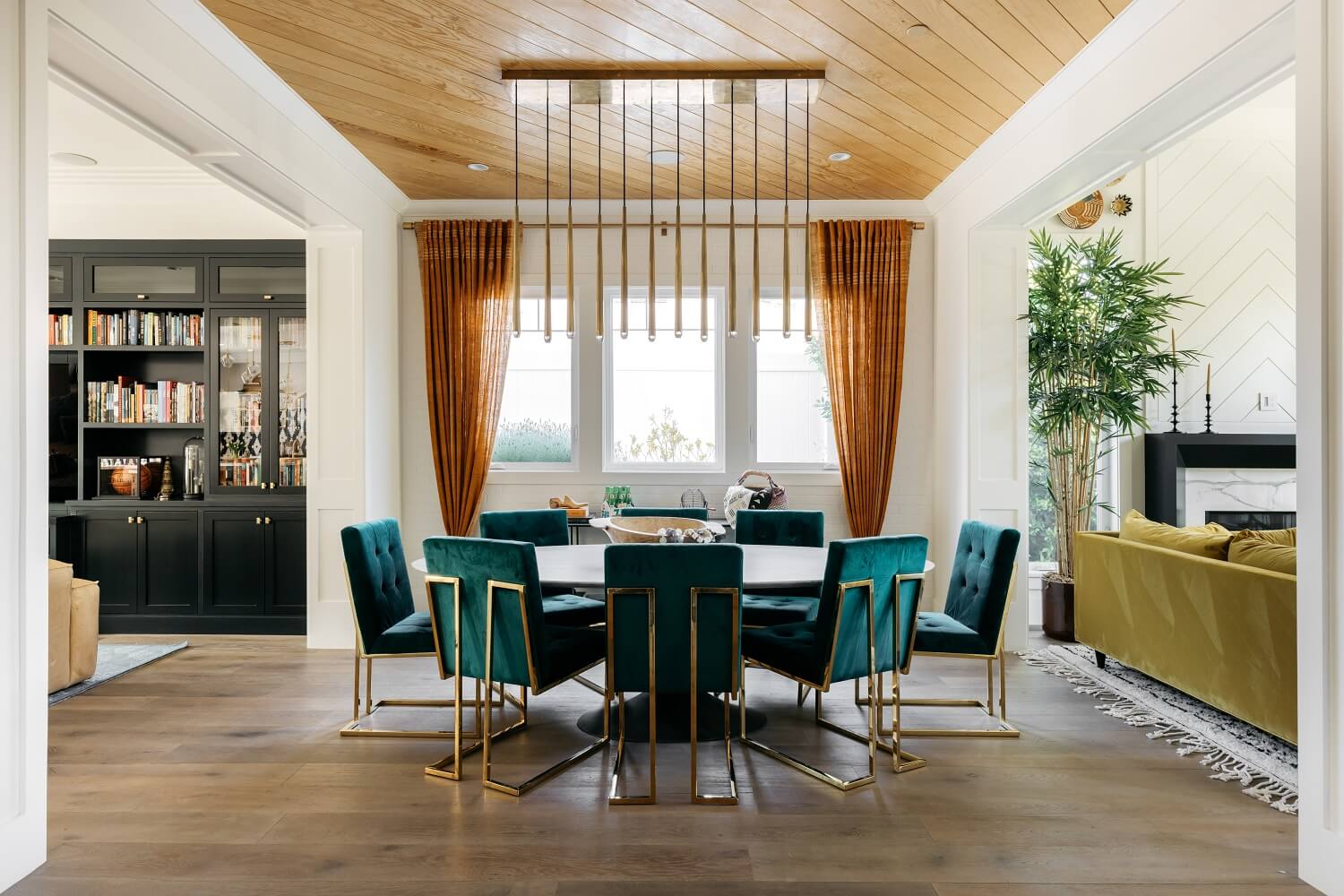 Color of the Year 2025 Prediction (with Color Palettes) 21 round-dining-table-green-velvet-chairs-daveed-diggs-emmy-raver-lampman-nordroom