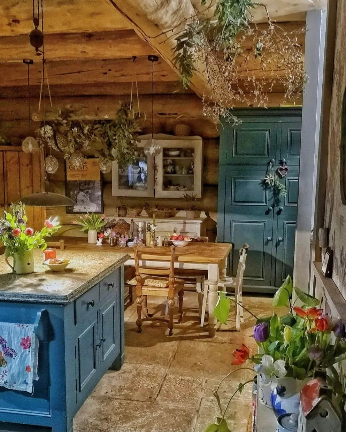Imrich Lodge: A Cozy Self-Built Log House in the Scottish Highlands 7 rustic-kitchen-blue-cabinets-log-house-scotland-nordroom
