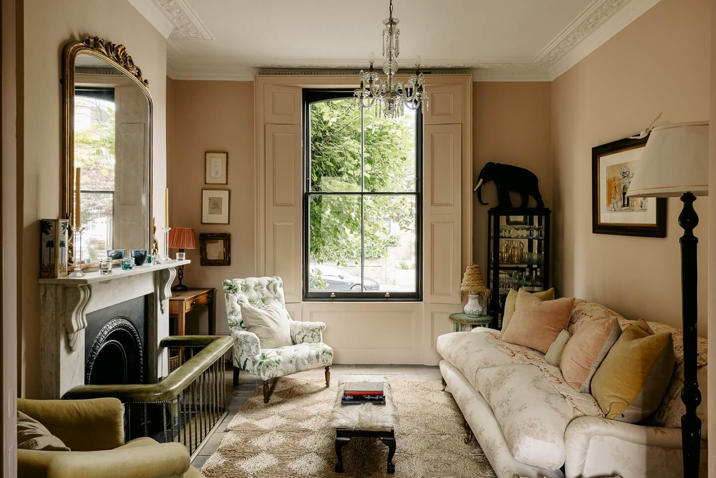 A Carefully Restored Victorian House in London 3 sitting-room-marble-fireplace-large-mirror-pink-walls-nordroom
