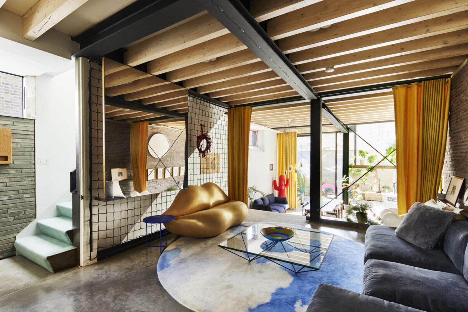 The Makers House: A Modern Achitectural Home in London 11 sitting-room-wooden-beams-large-mirror-the-makers-house-london-nordroom